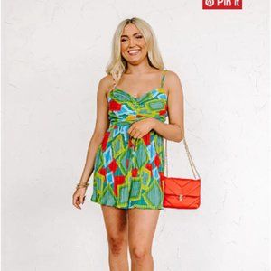 COASTAL CHARM PLEATED ROMPER IN GREEN